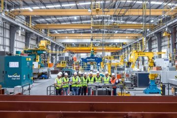 Team collaboration in a modern fabrication facility.